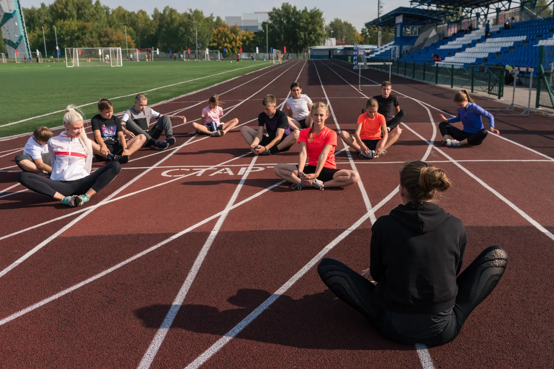 Youth fitness workshop - Kids learning exercise routines and healthy movement patterns
